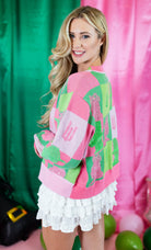 Queen Of Sparkles: Licensed Colorblock Glinda & Elphaba Profile Cardigan - Obsession Boutique