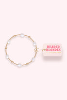 Beaded bracelet on a white background with 'Beaded Blondes' packaging.