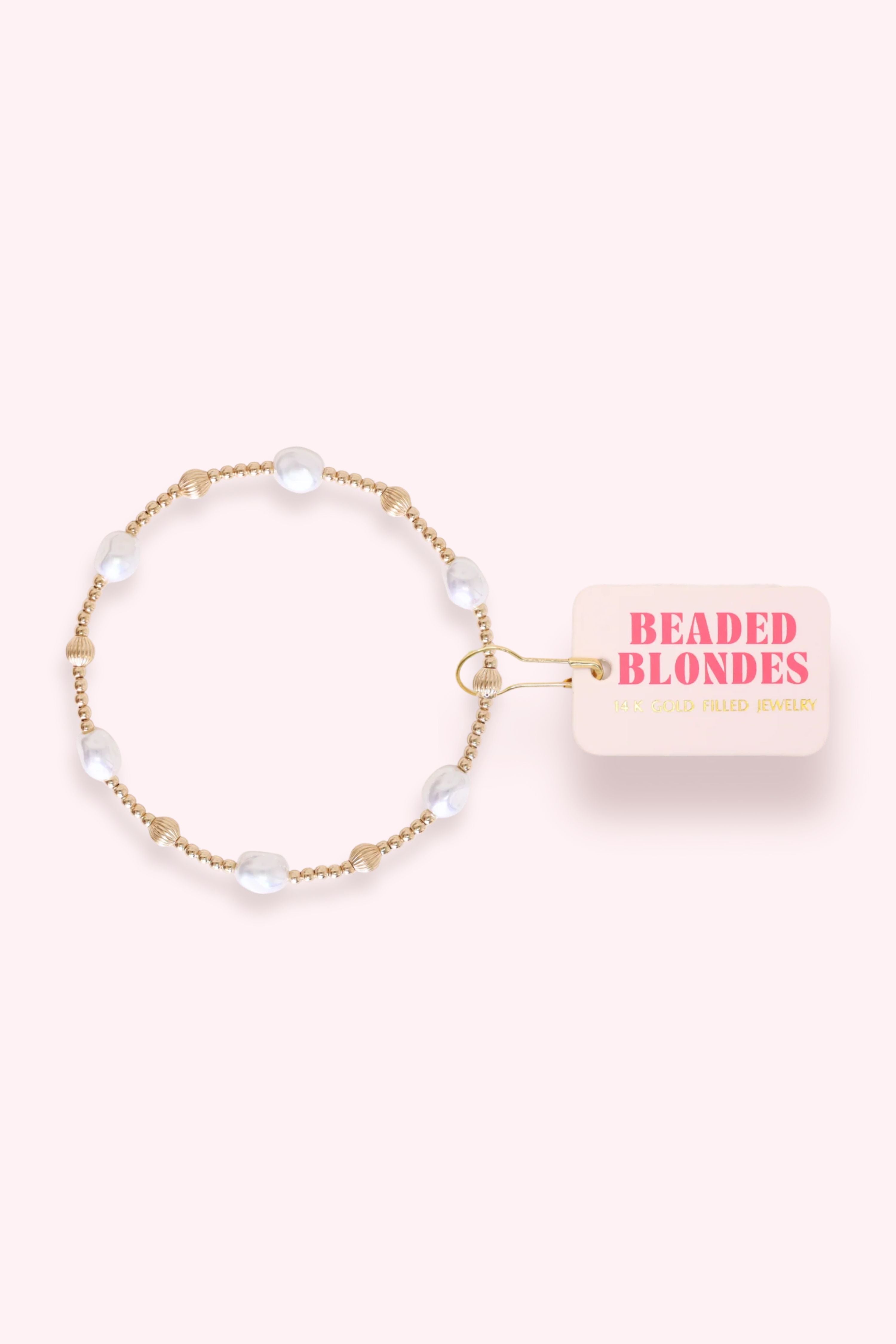 Beaded bracelet on a white background with 'Beaded Blondes' packaging.