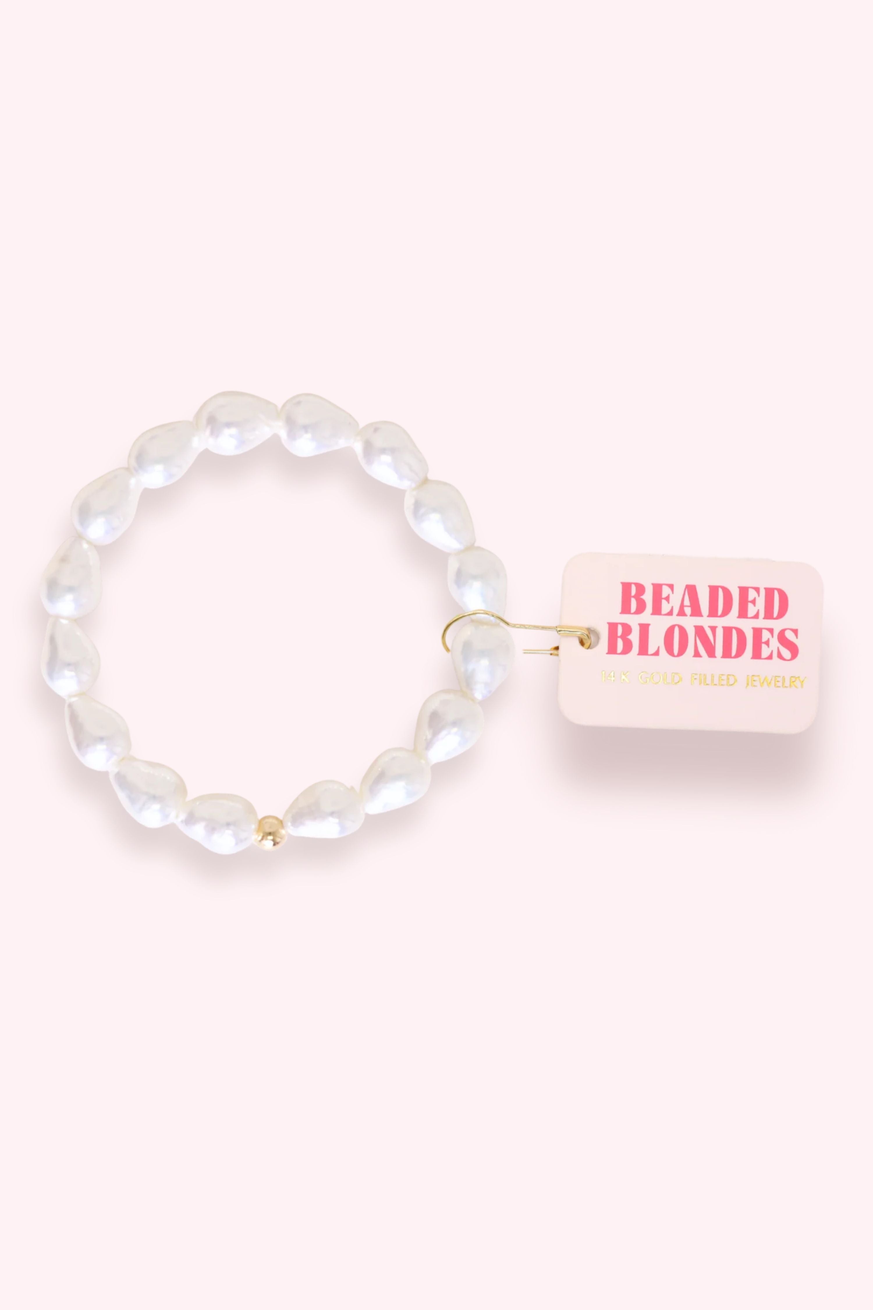 Beaded bracelet with a 'Beaded Blondes' tag on a white background