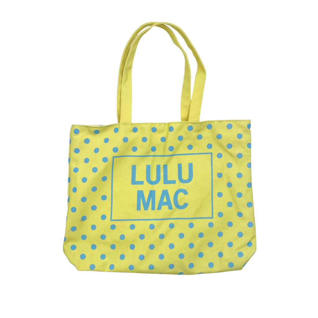 Yellow tote bag with blue polka dots and 'LULU MAC' text on a white background