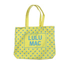 Yellow tote bag with blue polka dots and 'LULU MAC' text on a white background